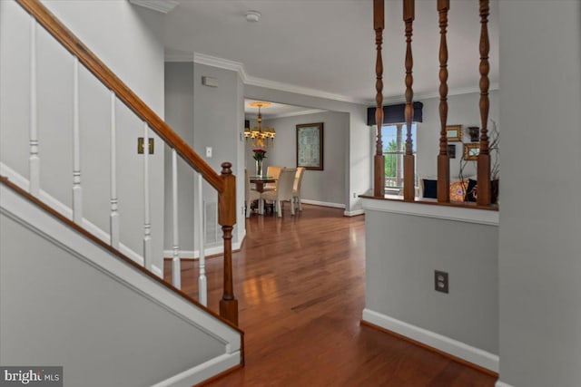 12401 Trotter Ter, Upper Marlboro, MD 20774 - foyer with a chandelier, wood finished floors, stairway, ornamental molding, and baseboards