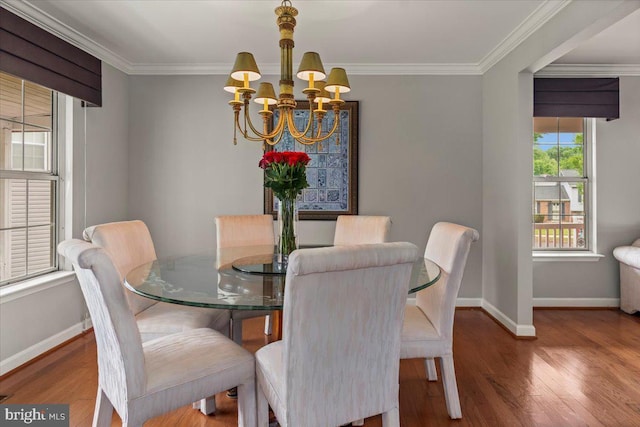 12401 Trotter Ter, Upper Marlboro, MD 20774 - dining space featuring a chandelier, baseboards, crown molding, and wood finished floors