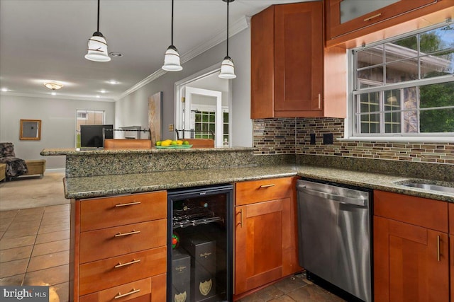 12401 Trotter Ter, Upper Marlboro, MD 20774 - kitchen with stainless steel dishwasher, wine cooler, ornamental molding, a peninsula, and tasteful backsplash