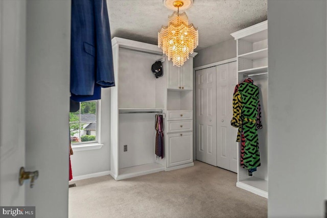 12401 Trotter Ter, Upper Marlboro, MD 20774 - spacious closet featuring a chandelier and carpet