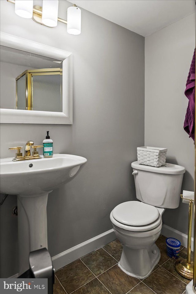 12401 Trotter Ter, Upper Marlboro, MD 20774 - bathroom featuring baseboards and toilet