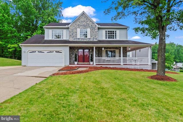 12401 Trotter Ter, Upper Marlboro, MD 20774 - view of front of home with concrete driveway, a front yard, covered porch, and stone siding