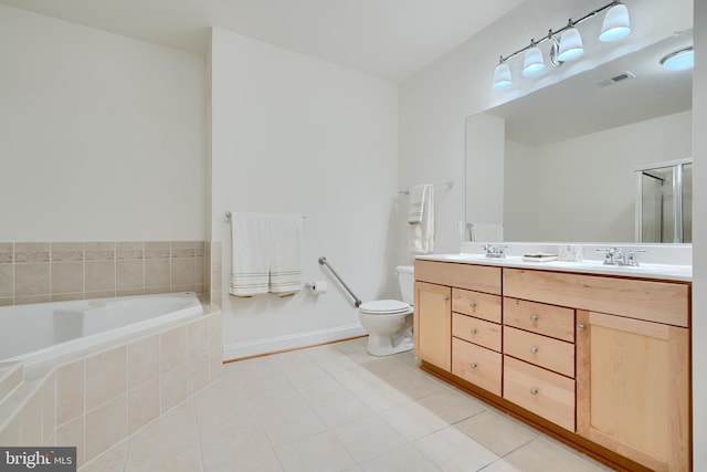 bathroom featuring tile patterned floors, visible vents, a sink, and double vanity