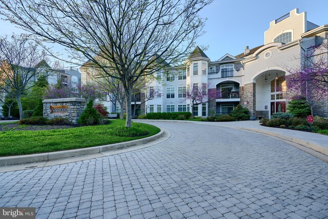 view of street featuring curbs