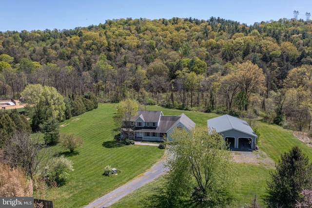 bird's eye view with a view of trees