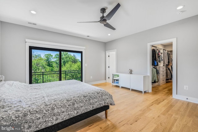 2600 3rd St N, Arlington, VA 22201 - bedroom with a walk in closet, visible vents, baseboards, light wood finished floors, and recessed lighting
