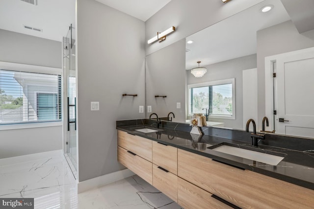 2600 3rd St N, Arlington, VA 22201 - full bathroom with double vanity, a stall shower, a sink, baseboards, and marble finish floor
