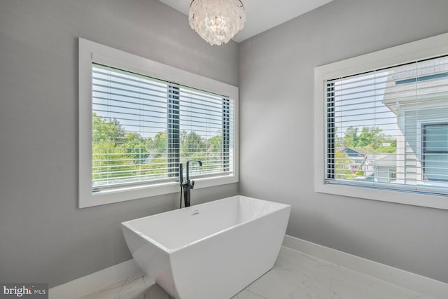 2600 3rd St N, Arlington, VA 22201 - laundry area featuring an inviting chandelier, baseboards, and marble finish floor