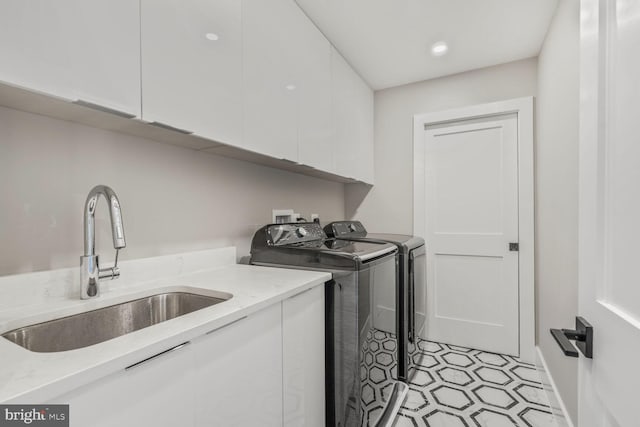 2600 3rd St N, Arlington, VA 22201 - clothes washing area with a sink, separate washer and dryer, and cabinet space