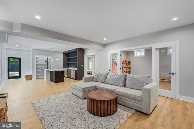 2600 3rd St N, Arlington, VA 22201 - living room featuring light wood-style floors, recessed lighting, and a wealth of natural light
