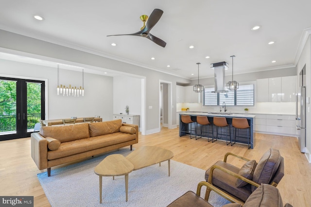 2600 3rd St N, Arlington, VA 22201 - living area with ornamental molding, recessed lighting, and light wood-style flooring