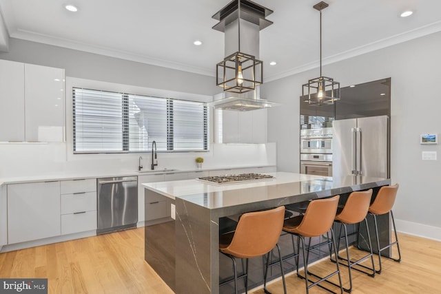 2600 3rd St N, Arlington, VA 22201 - kitchen featuring a sink, white cabinetry, modern cabinets, and stainless steel appliances