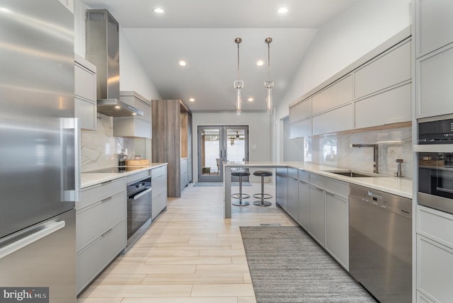 1222 Brian Ln, Hanover, PA 17331 - kitchen featuring stainless steel appliances, wall chimney range hood, french doors, gray cabinetry, and recessed lighting