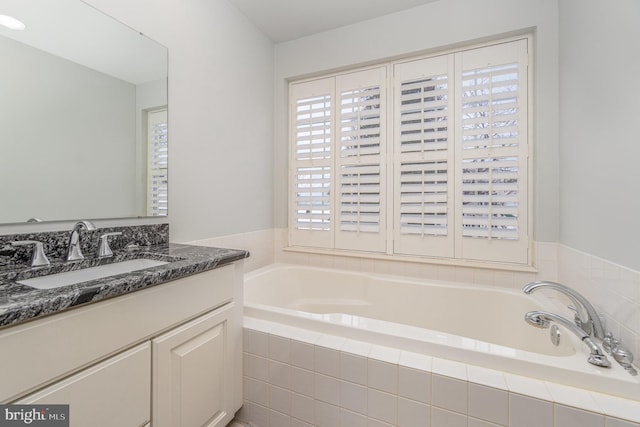 1222 Brian Ln, Hanover, PA 17331 - bathroom featuring plenty of natural light, a garden tub, and vanity