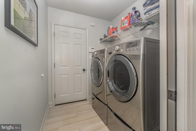 1222 Brian Ln, Hanover, PA 17331 - laundry area featuring washer and clothes dryer, light wood finished floors, and baseboards