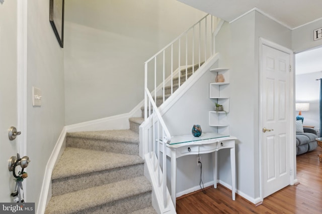 12328 Woodlawn Ct, Woodbridge, VA 22192 - stairs with wood finished floors, baseboards, and ornamental molding