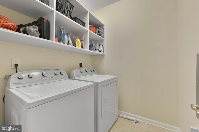 20620 Hope Spring Ter Unit 206, Ashburn, VA 20147 - washroom with independent washer and dryer and baseboards