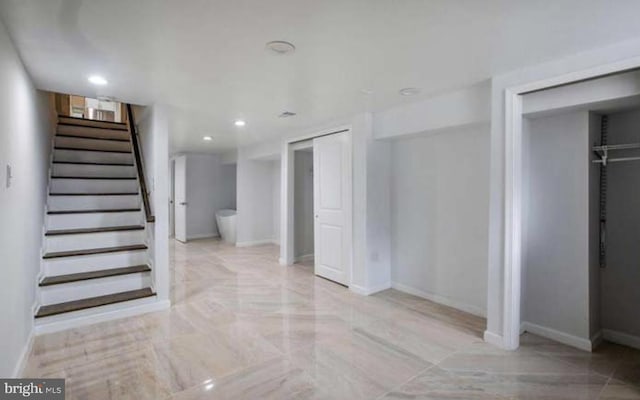 staircase featuring recessed lighting and baseboards