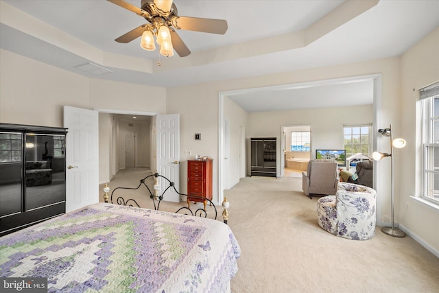 bedroom featuring baseboards, carpet, and a ceiling fan
