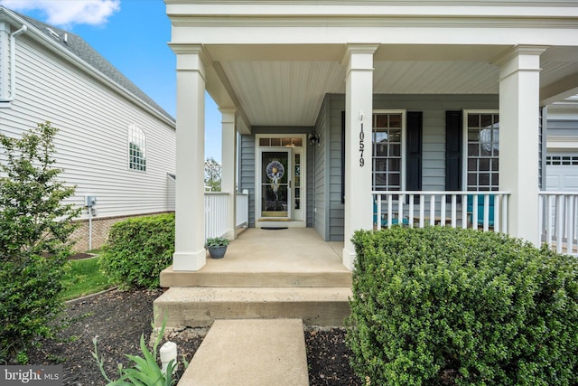 property entrance with a porch