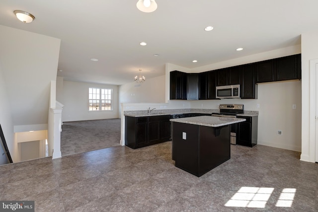 460 Rederick Lane Massey Lot 61, Middletown, DE 19709 - kitchen with appliances with stainless steel finishes, dark cabinets, a sink, a center island, and recessed lighting