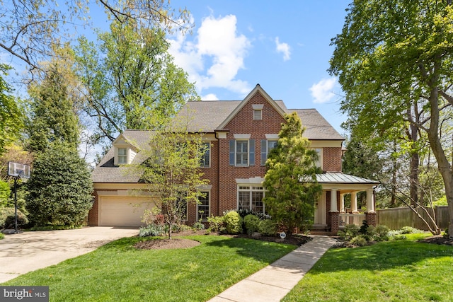 view of front of property with driveway, brick siding, and a porch