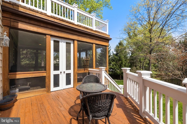 wooden deck with french doors