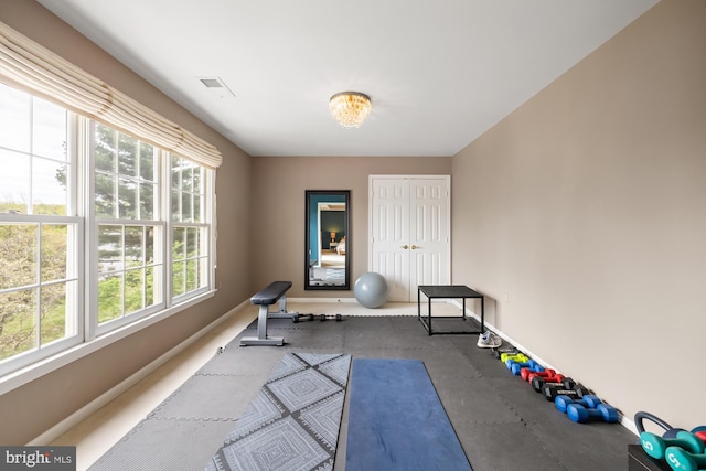 exercise area with baseboards