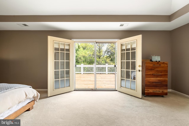 bedroom with carpet, access to outside, baseboards, and french doors