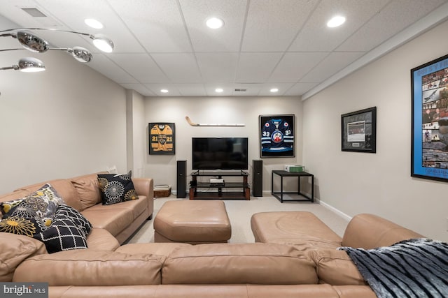 carpeted living room with recessed lighting and baseboards