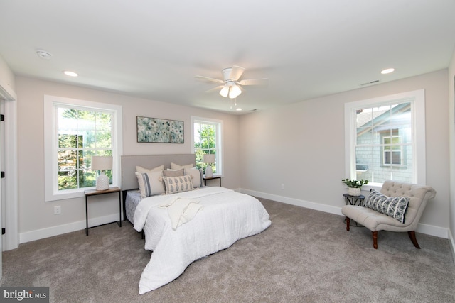 carpeted bedroom with baseboards, visible vents, a ceiling fan, and recessed lighting