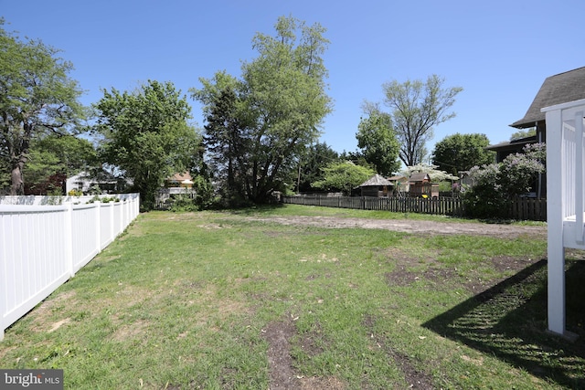 view of yard featuring fence