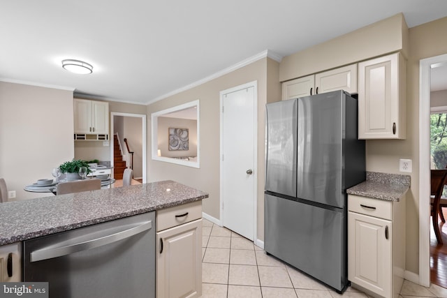 2314 Concert Ct, Vienna, VA 22181 - kitchen featuring light stone countertops, light tile patterned flooring, white cabinetry, baseboards, and appliances with stainless steel finishes