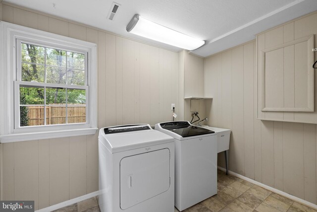 2314 Concert Ct, Vienna, VA 22181 - laundry room featuring washer and dryer, visible vents, laundry area, and baseboards
