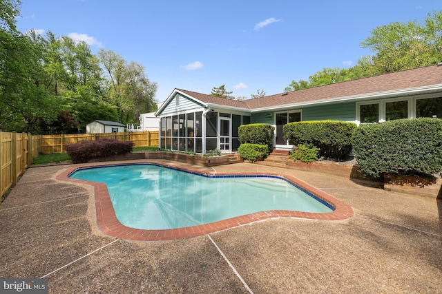 2314 Concert Ct, Vienna, VA 22181 - view of pool with a sunroom, a patio, a fenced in pool, and a fenced backyard