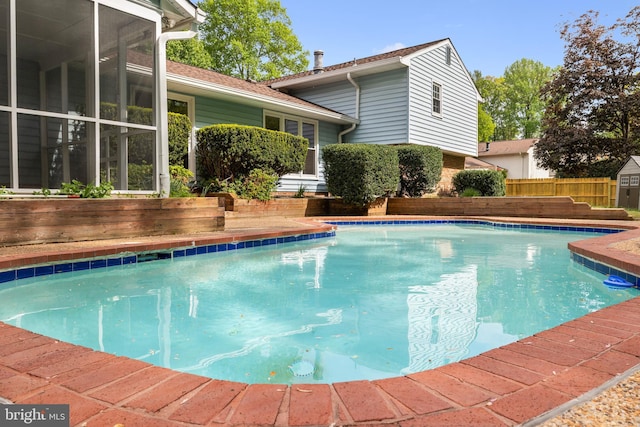 2314 Concert Ct, Vienna, VA 22181 - view of pool featuring a storage shed, a fenced in pool, and fence