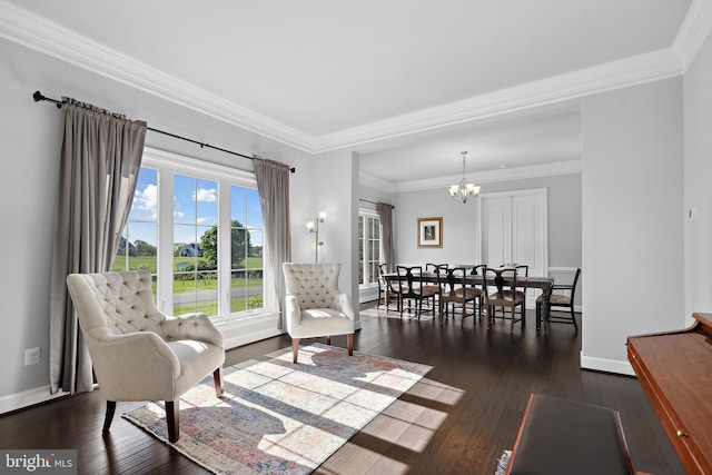 42438 Black Talon Ct, Leesburg, VA 20176 - living area with a chandelier, baseboards, dark wood-type flooring, and crown molding