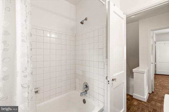 bathroom featuring shower / bath combination with curtain
