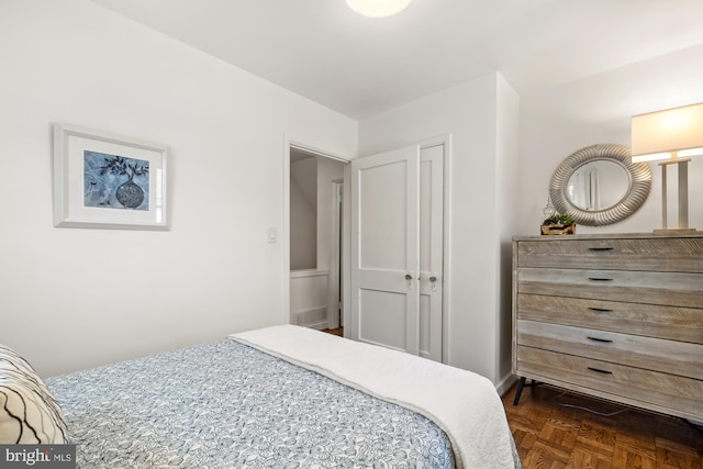 bedroom featuring visible vents