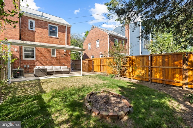 back of property featuring brick siding, an outdoor living space, central air condition unit, and a yard