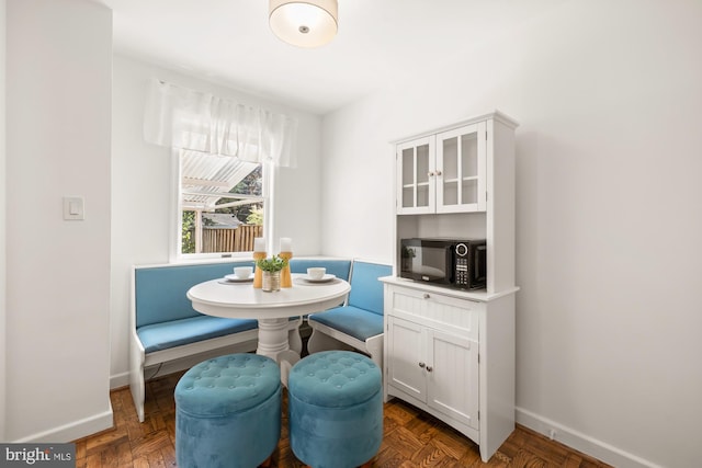 dining room with baseboards