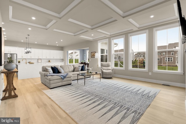 15613 Althea Ln, Gainesville, VA 20155 - living room featuring light wood-style floors, coffered ceiling, beam ceiling, a chandelier, and recessed lighting
