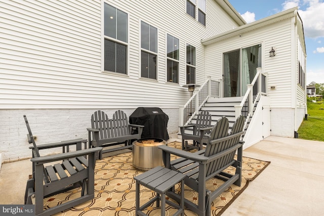 15613 Althea Ln, Gainesville, VA 20155 - view of patio with area for grilling and a fire pit