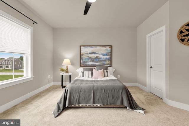 15613 Althea Ln, Gainesville, VA 20155 - carpeted bedroom with baseboards and ceiling fan