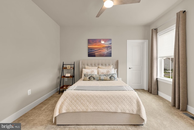 15613 Althea Ln, Gainesville, VA 20155 - bedroom with light carpet, baseboards, and a ceiling fan