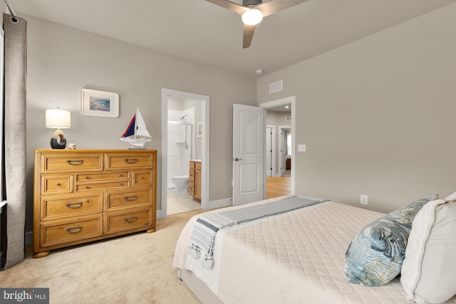 15613 Althea Ln, Gainesville, VA 20155 - bedroom with light colored carpet, connected bathroom, and a ceiling fan