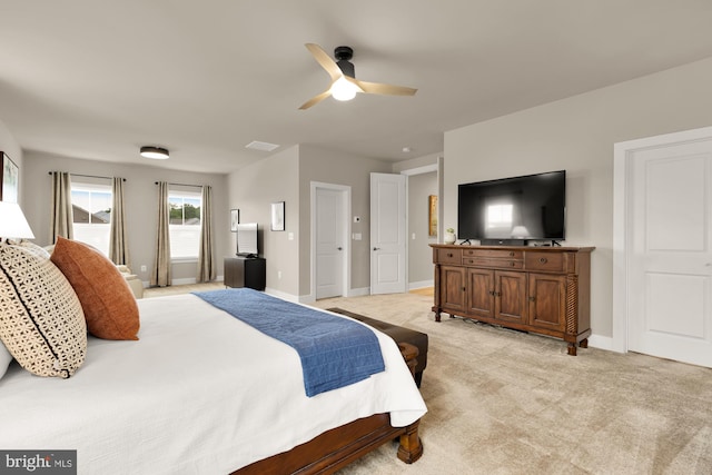 15613 Althea Ln, Gainesville, VA 20155 - bedroom with light carpet, baseboards, and a ceiling fan