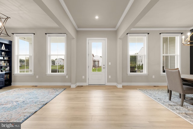 15613 Althea Ln, Gainesville, VA 20155 - entrance foyer featuring healthy amount of natural light, light wood finished floors, baseboards, and ornamental molding