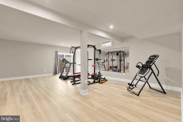 15613 Althea Ln, Gainesville, VA 20155 - workout room with wood finished floors, baseboards, and recessed lighting