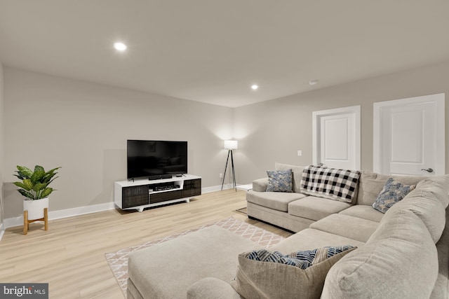 15613 Althea Ln, Gainesville, VA 20155 - living area featuring baseboards, light wood-style flooring, and recessed lighting